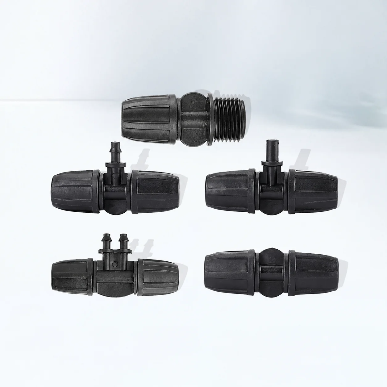 Compression connector with twin barbs